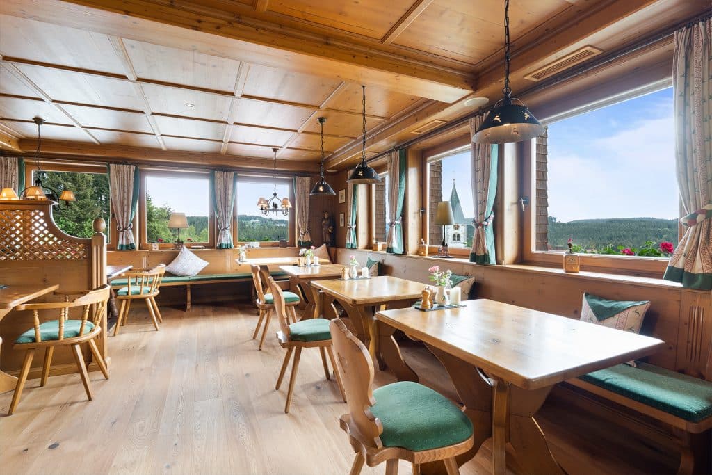 Feldberg restaurant with chairs and tables and a view of the Black Forest
